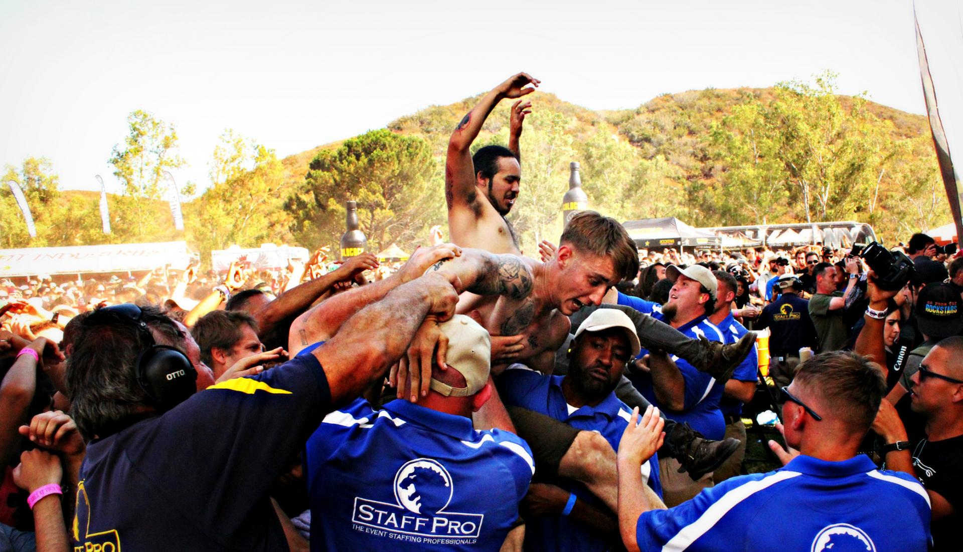 Fans crowd surfing